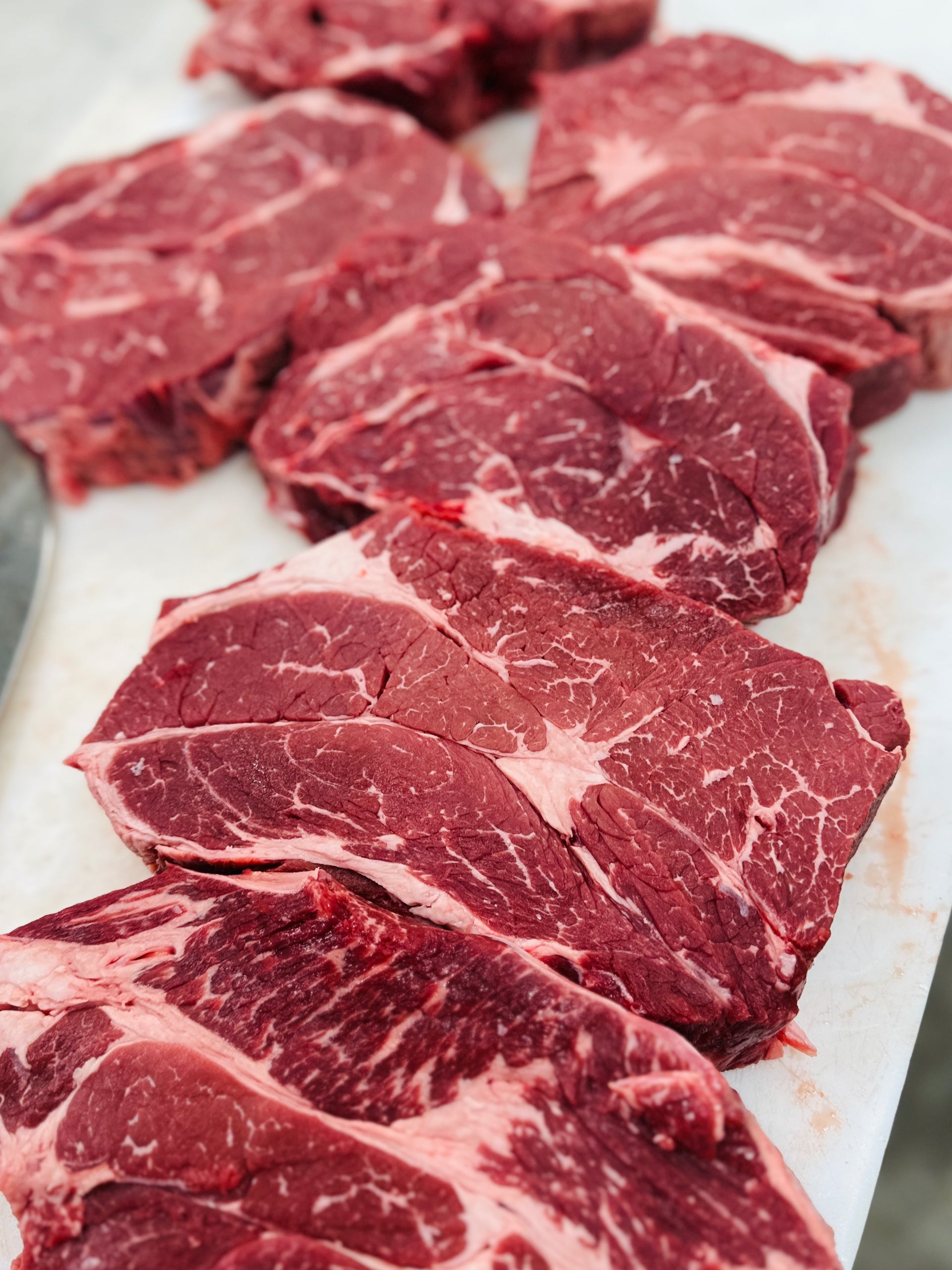 Fresh-cut chuck steaks